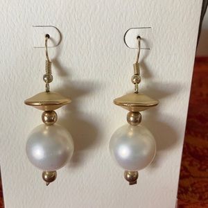 Gold metal and large Pearl artist made earrings. For pierced ears